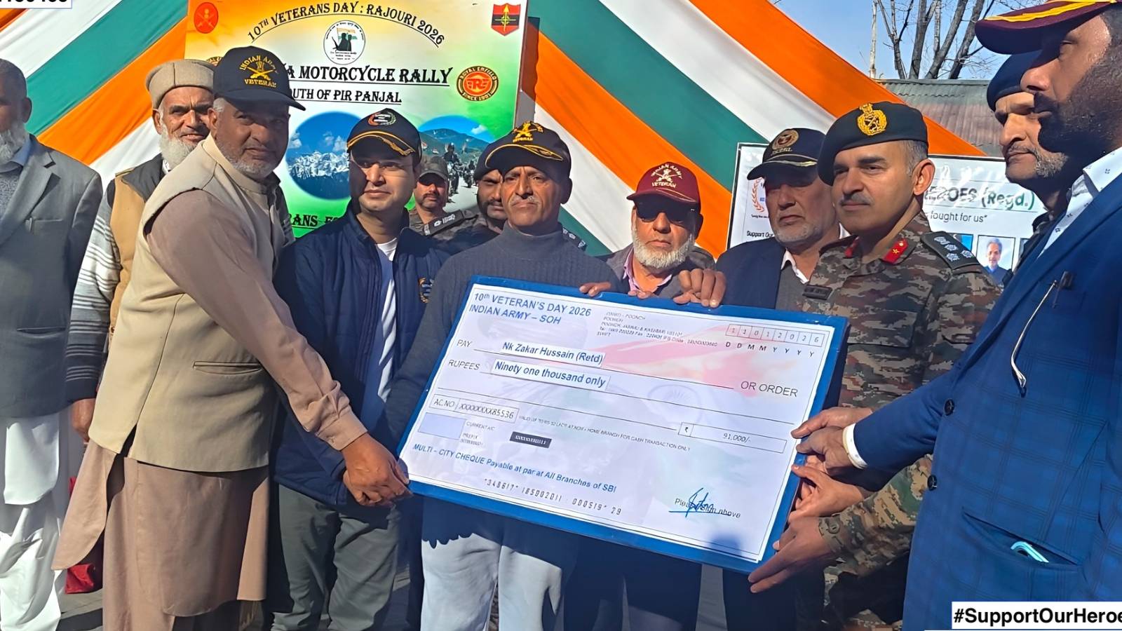 Handing over cheque of Rs 91,000 to an Ex-soldier in Poonch (J&K)