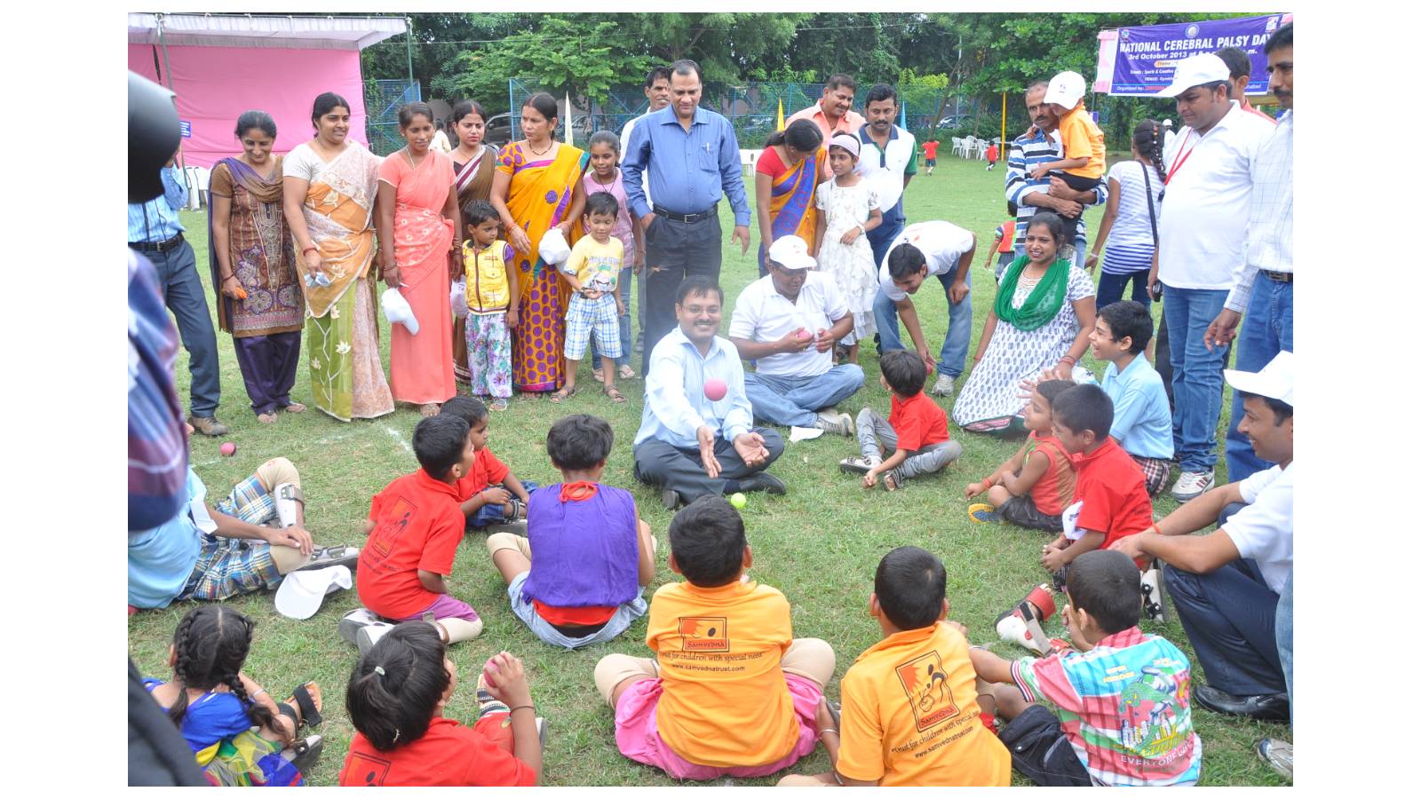 Chairman Dr Jain playing with Cp Children 