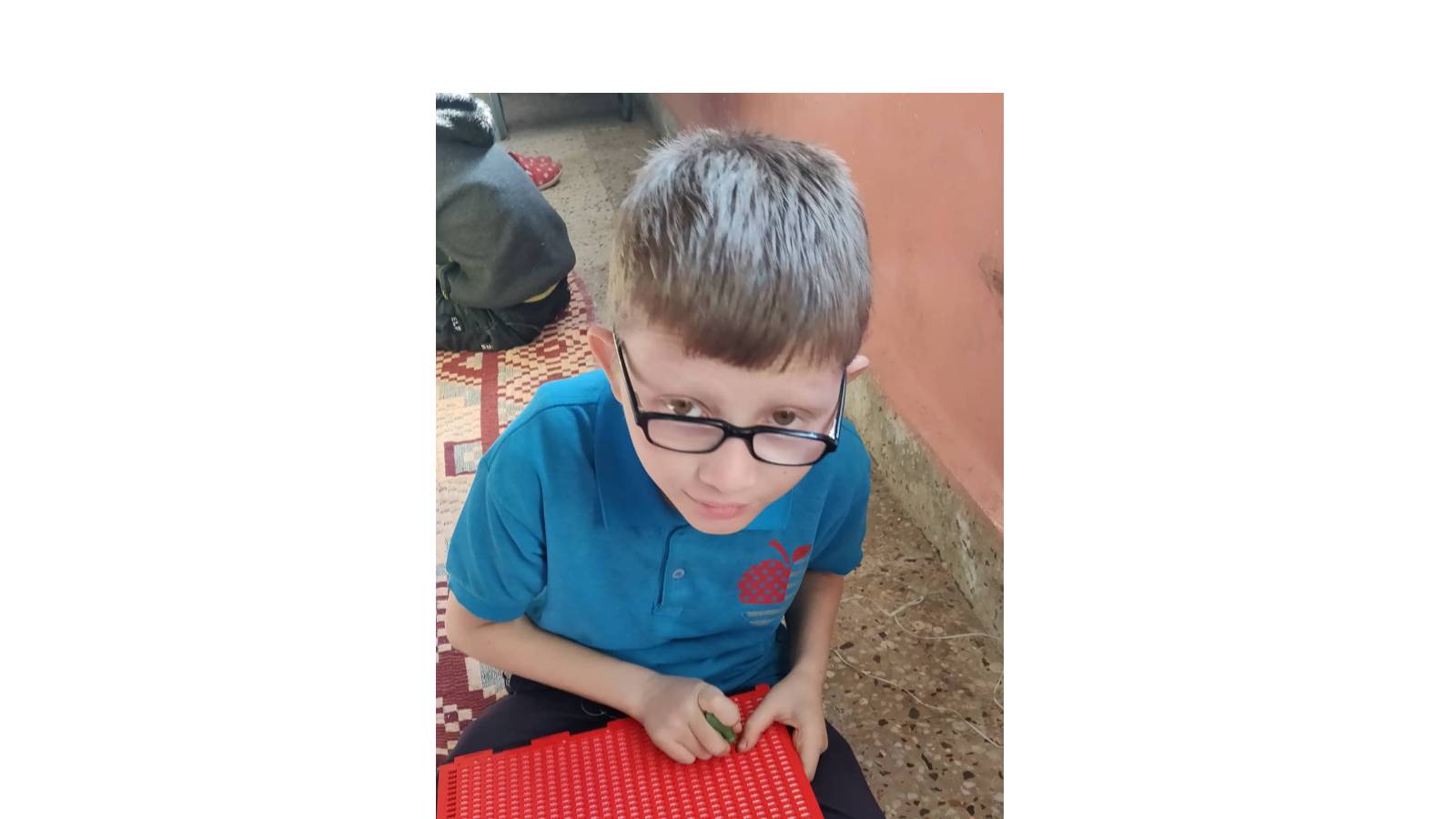 Learning Braille through Braille slate and pen