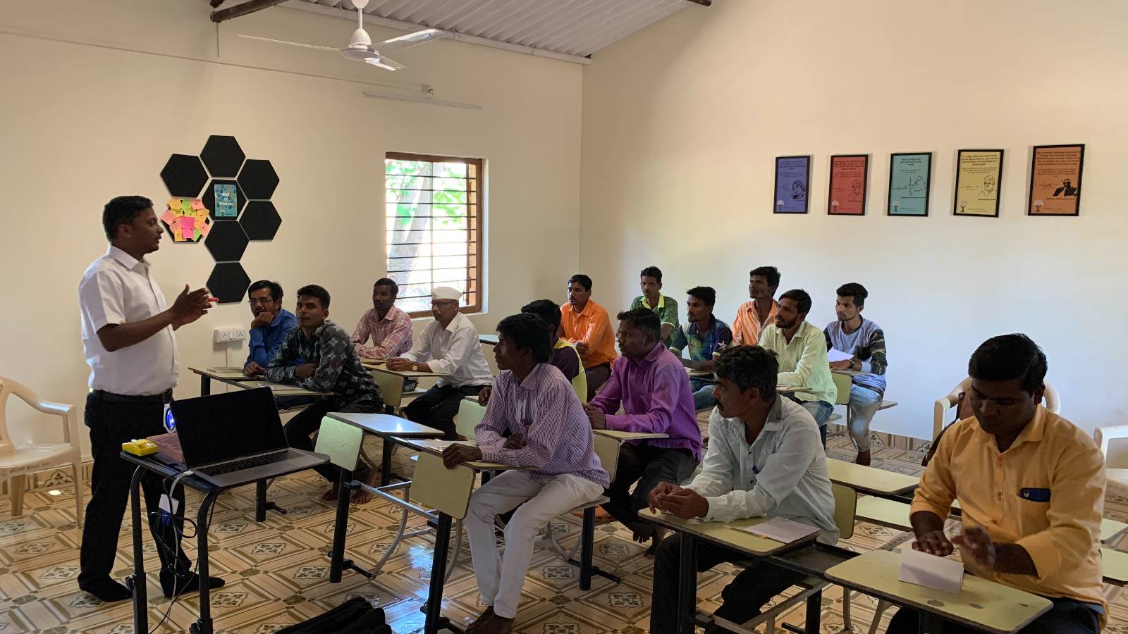 Teachers from KVK, Dahanu imparting skills related to poultry farming