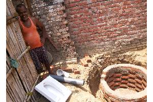Sponsor the construction of a low cost toilet for a poor family in the villages of Bihar