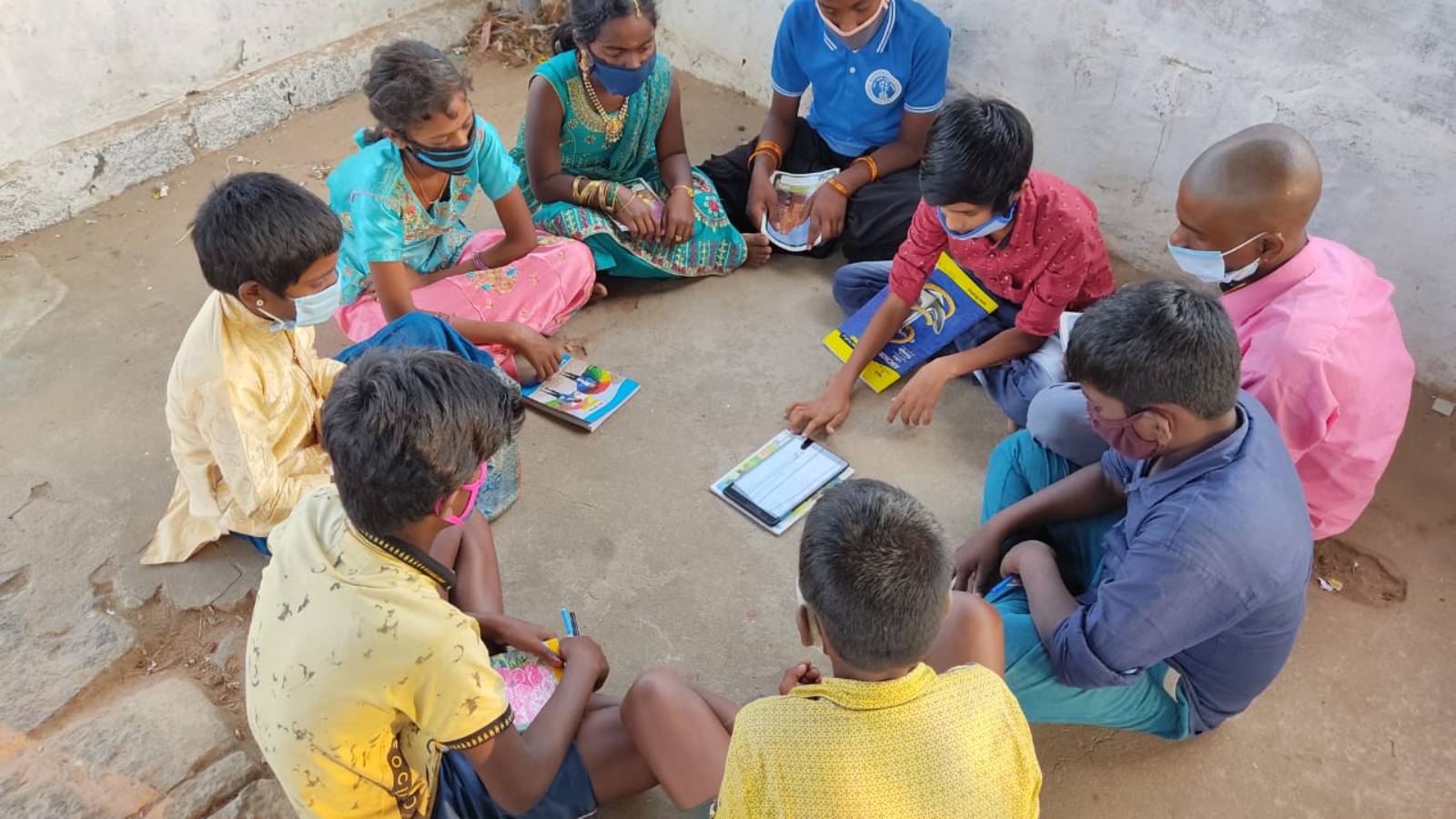 Tabs to children at remote village near Vandavasi