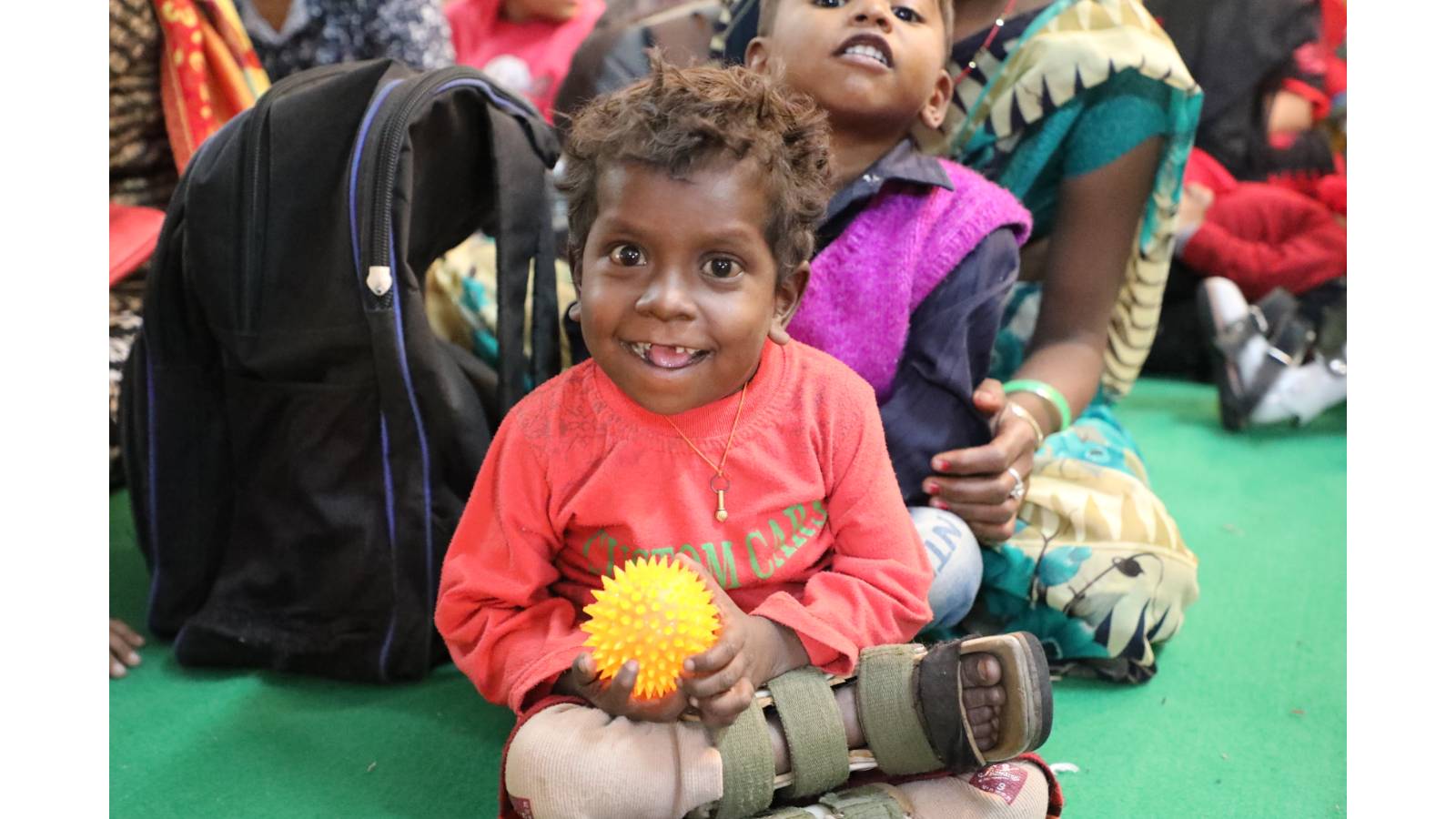 happiness on the face of child with cerebral palsy 