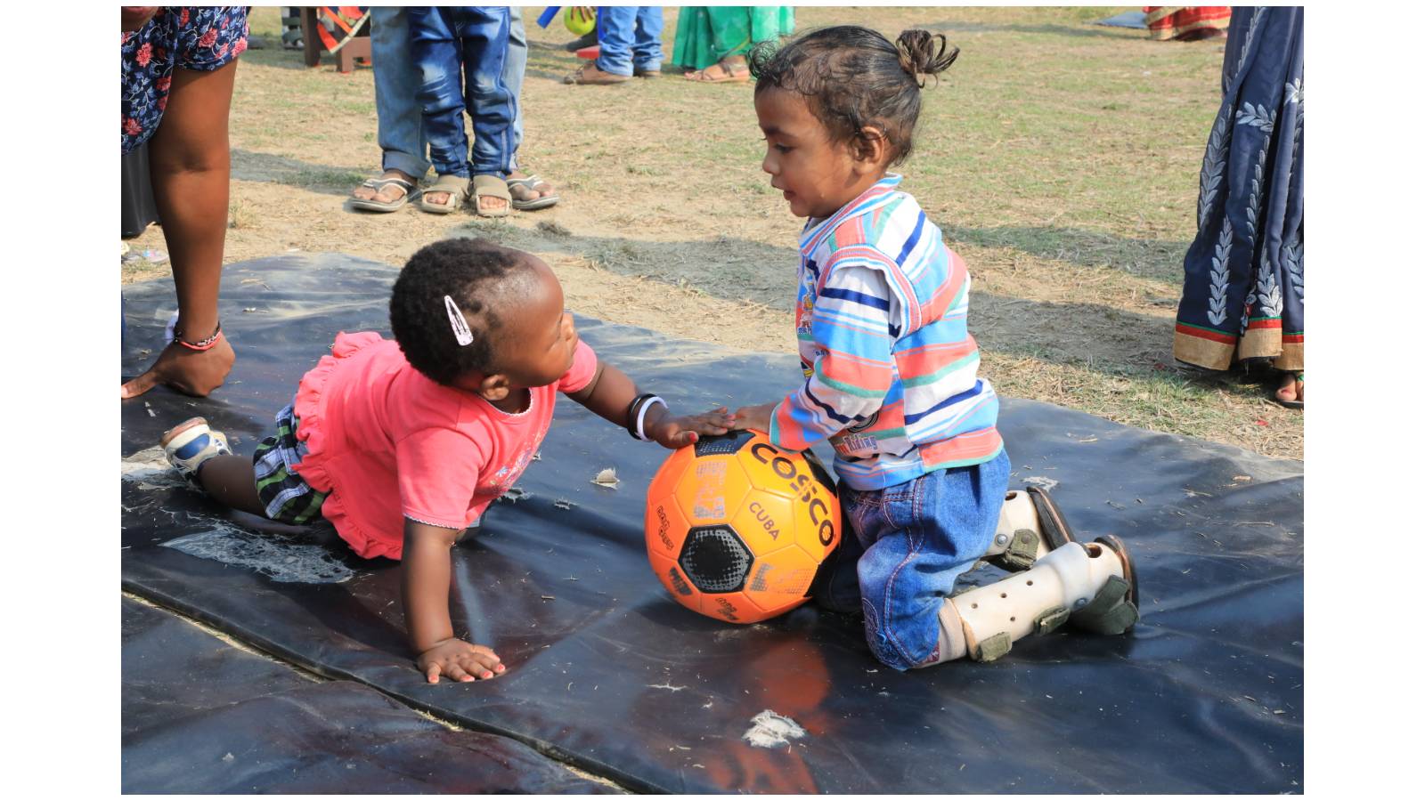 Child with CP playing with normal child